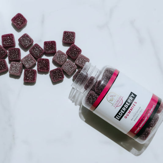  Elderberry Gummies with a jar on a white background